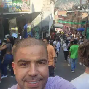 Things to do in Medellin – busy street scene in Comuna 13 showing safe tourist atmosphere
