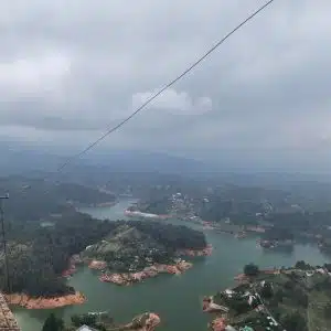 Aerial view of Guatapé reservoir with green islands from El Peñol summit Colombia