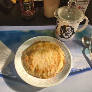 The arepa de chócolo gratinée